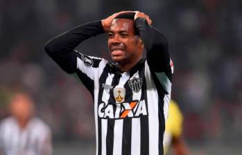 Tras su paso por Italia, Robinho jugo para los clubes Atlético Mineiro y Santos de su país. .OTO: AFP